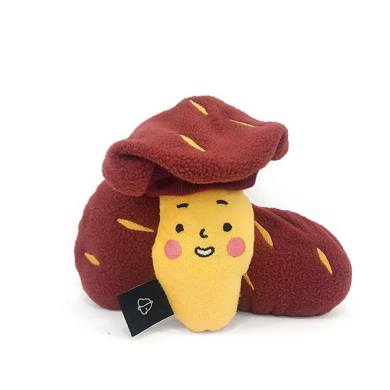 Red sweet potato dog puzzle toy with removable peel showing internal treat pockets
