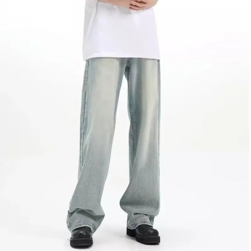 Blue men's loose casual trousers with a retro style and elasticated waistband.