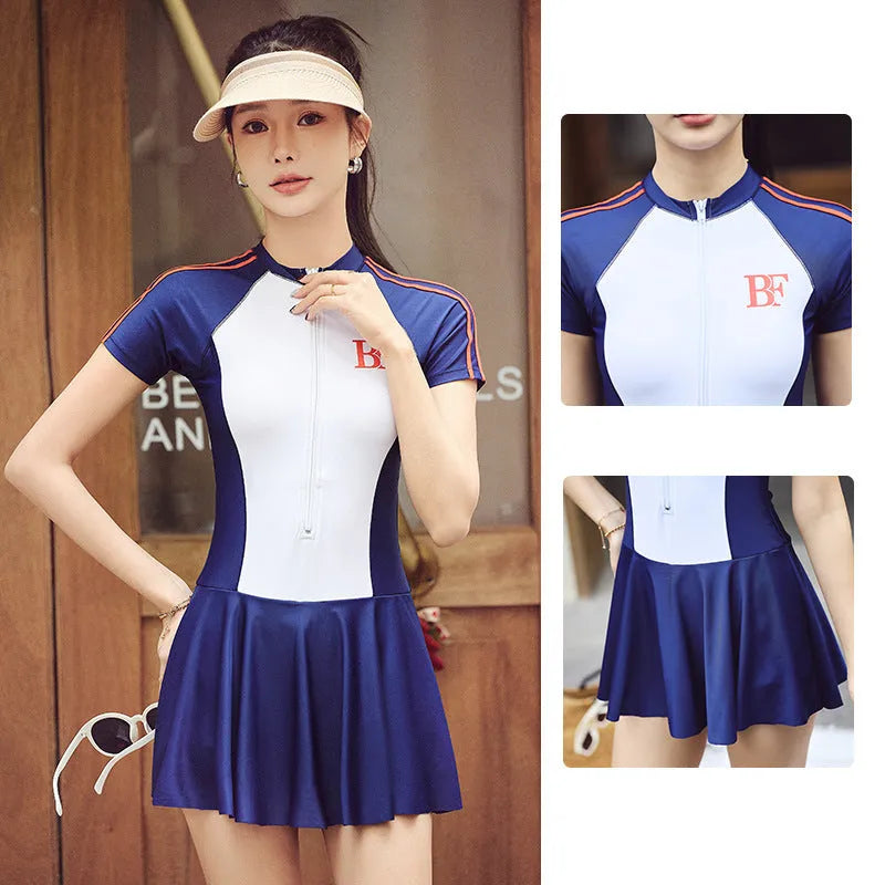 Ladies conservative style one-piece swimsuit in elastic polyester for sports.