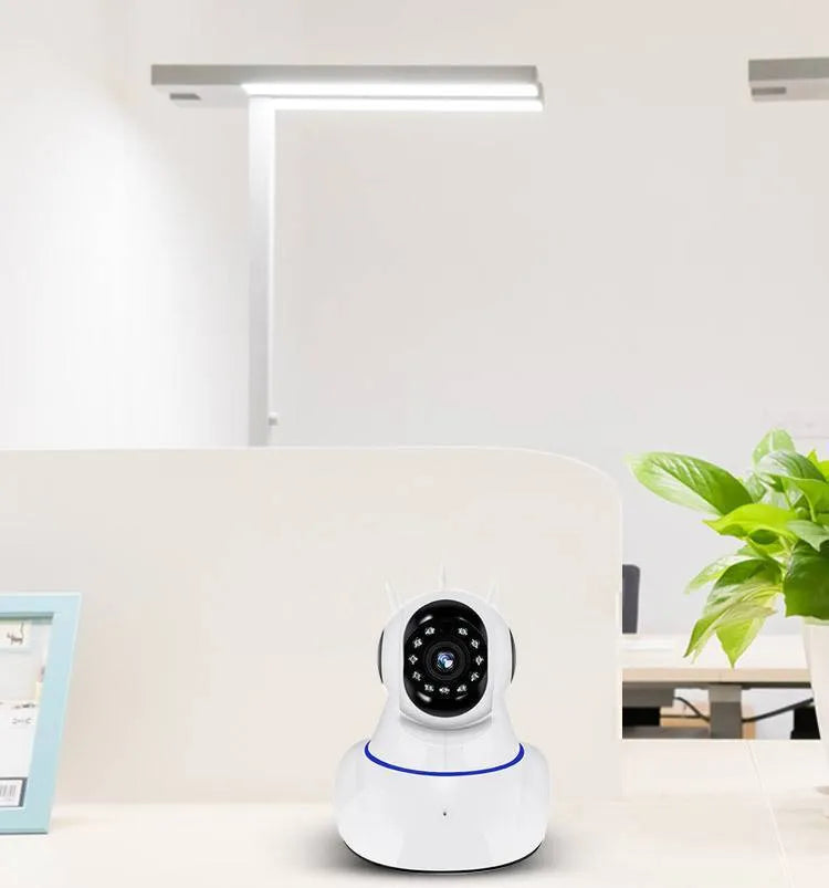 White dome-shaped wireless HD night vision surveillance camera for indoor and outdoor use.