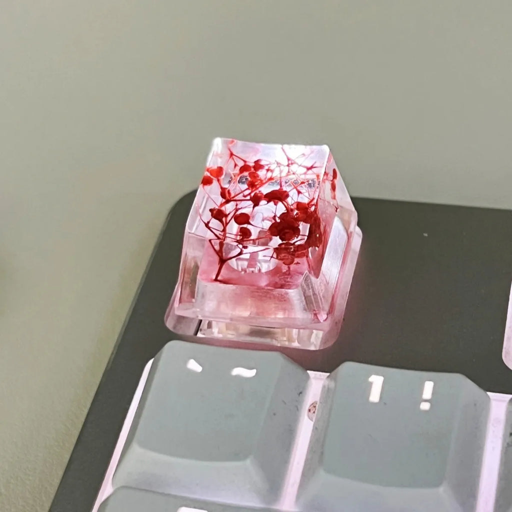 High-transparency starry sky design resin artisan keycap for mechanical keyboards, shown in green colour.