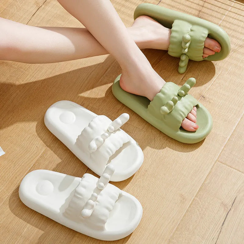 Women's EVA flip flop slippers with deer horn cut-out design in light yellow, showing non-slip sole.