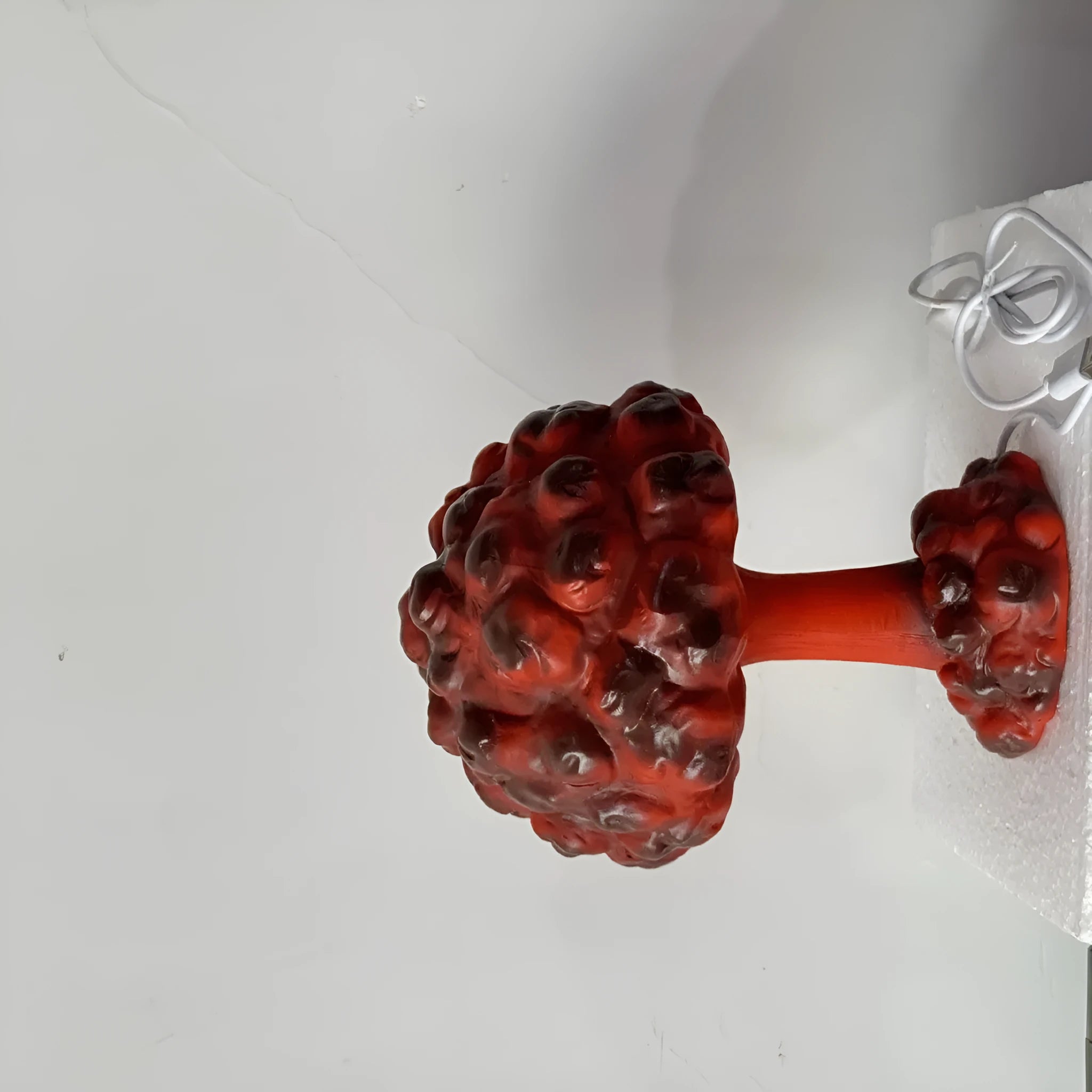 Modern mushroom cloud shaped table lamp with USB power connector on decorative base