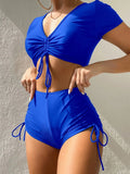 Lady's dark green lace-up bow two-piece swimsuit set for swimming.