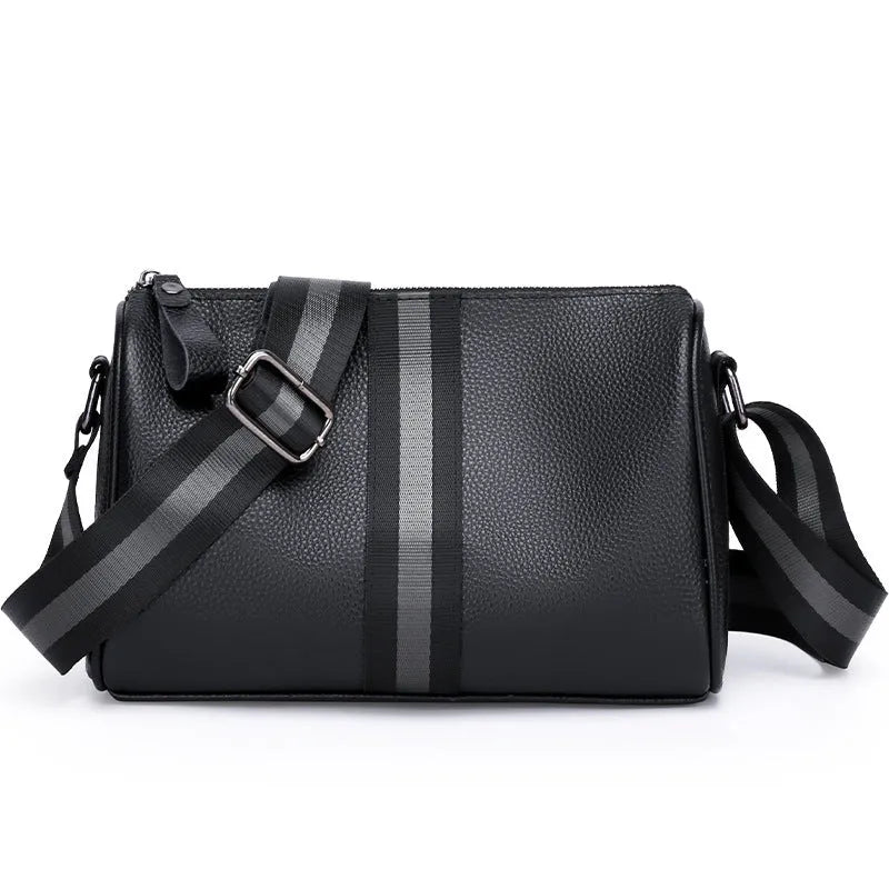 Black genuine leather one-shoulder crossbody bag showing 24cm width
