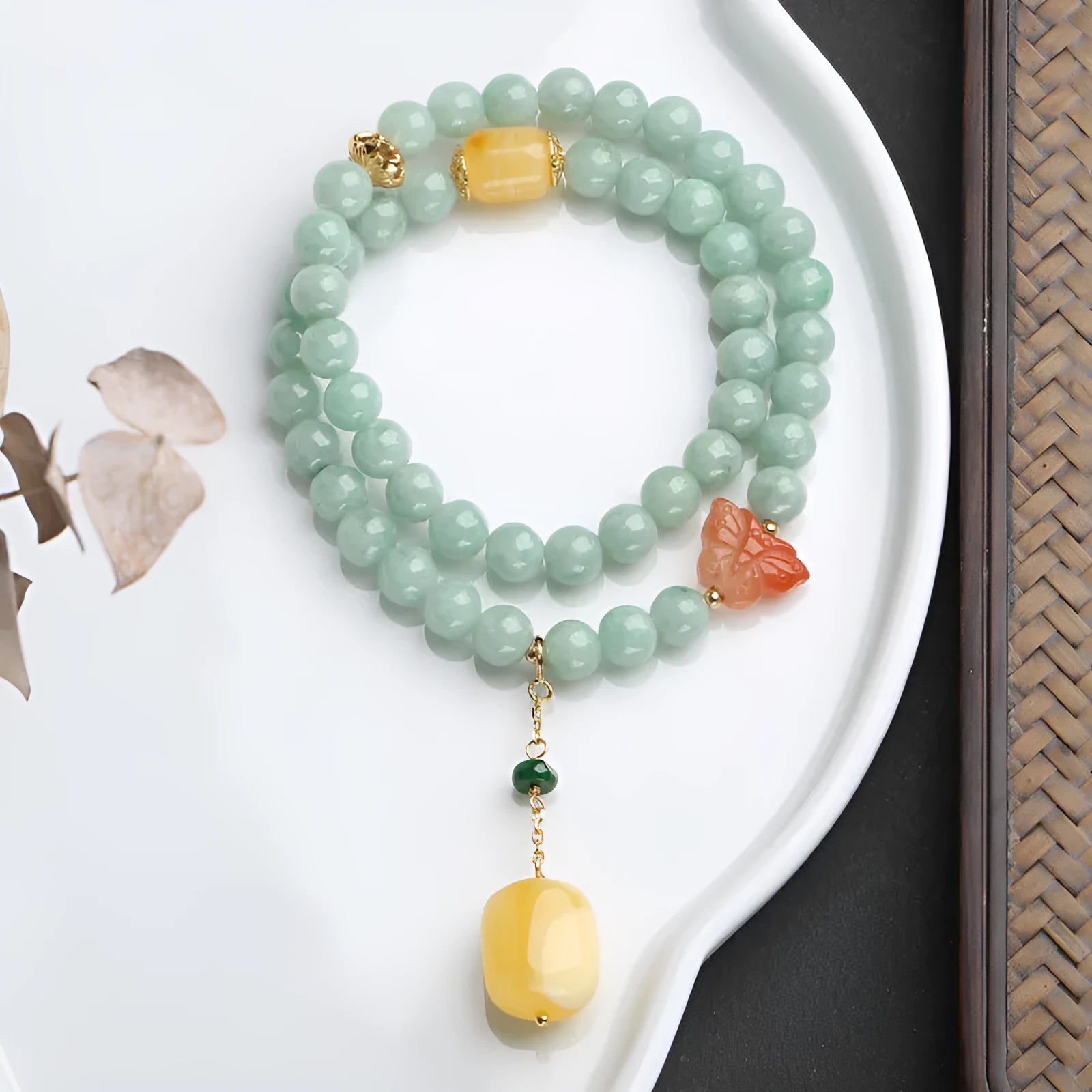 Double-layer women's bracelet with jade round beads and beeswax barrel beads in geometric hanging design