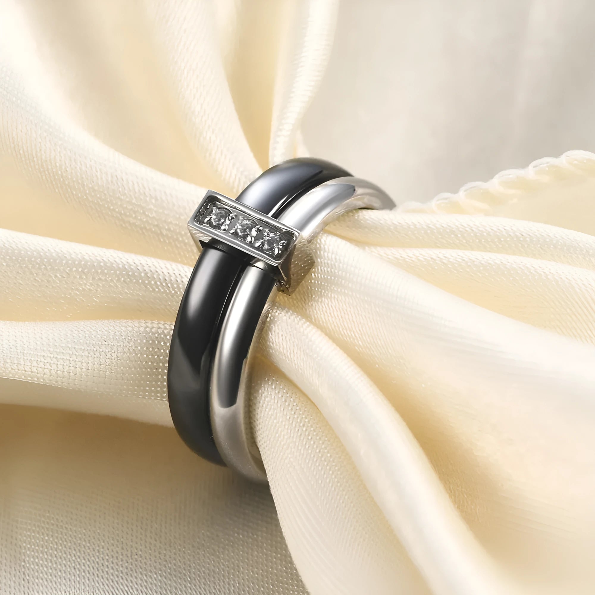 Geometric ceramic women's ring with a round 6mm zirconia stone in steel black colour.