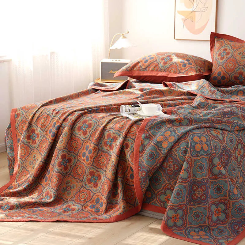 Cotton gauze three-piece bedding set with floral pattern including blanket and two pillowcases
