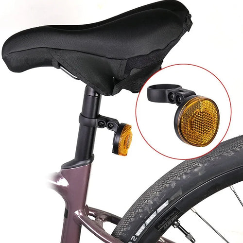Plastic bicycle taillight bracket with anti-theft features mounted on seat post in red colour