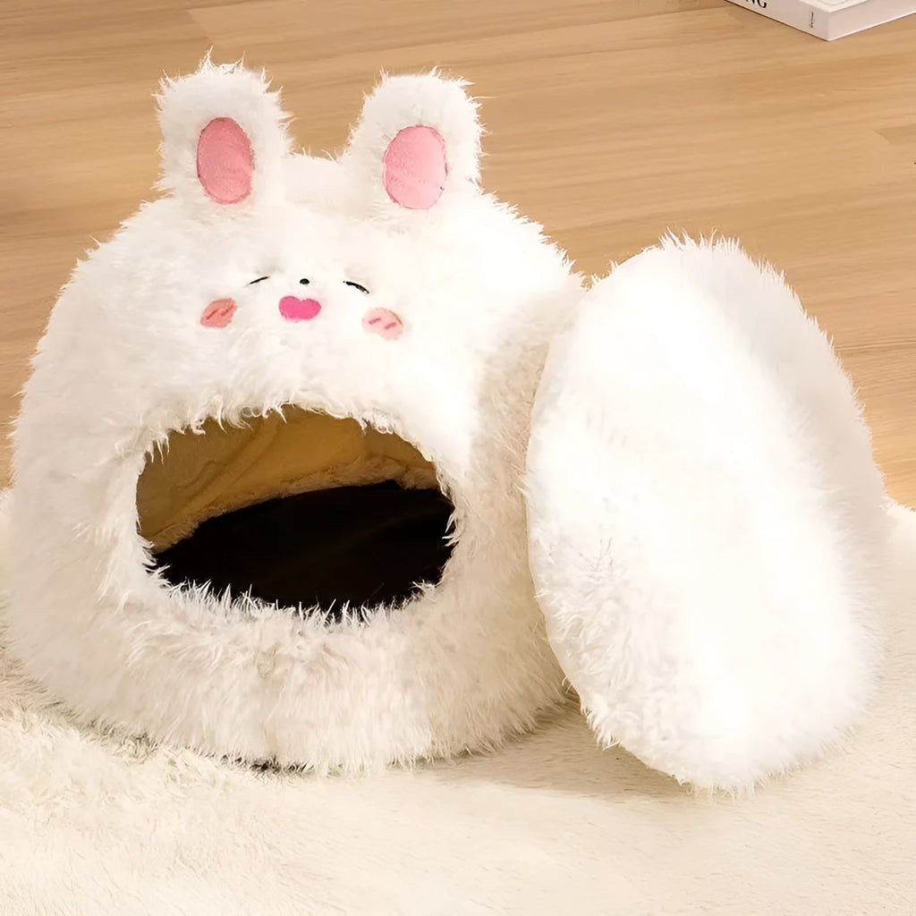 Semi-enclosed plush cat litter kennel tent in bear pattern, shown in a room setting.