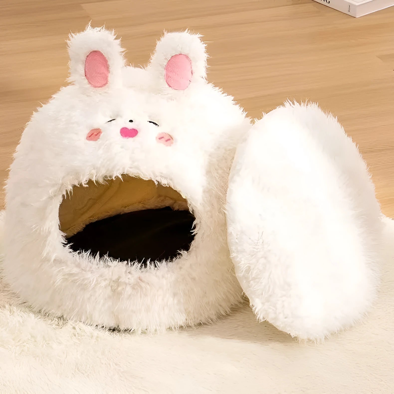 Semi-enclosed plush cat litter kennel tent in bear pattern, shown in a room setting.