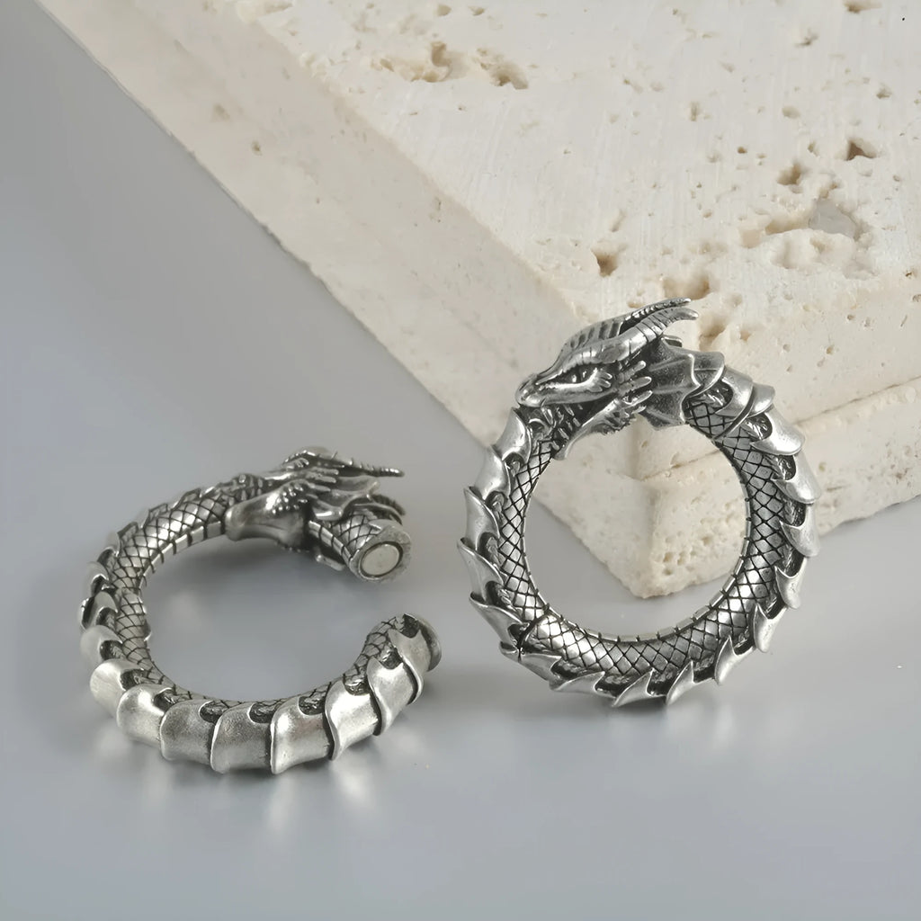 Large geometric dragon-shaped hollow out earrings in antique silver finish.