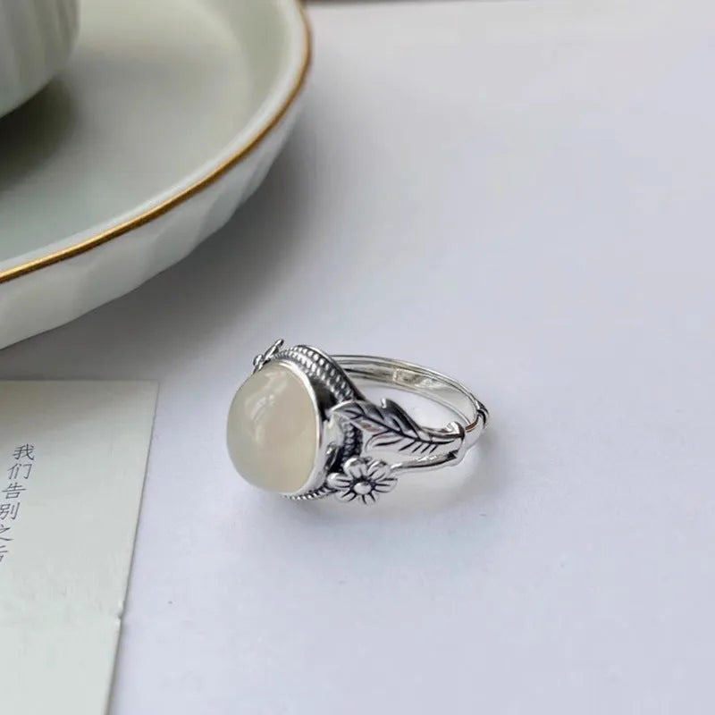 Adjustable vintage copper ring with imitation white chalcedony and U-shaped band design