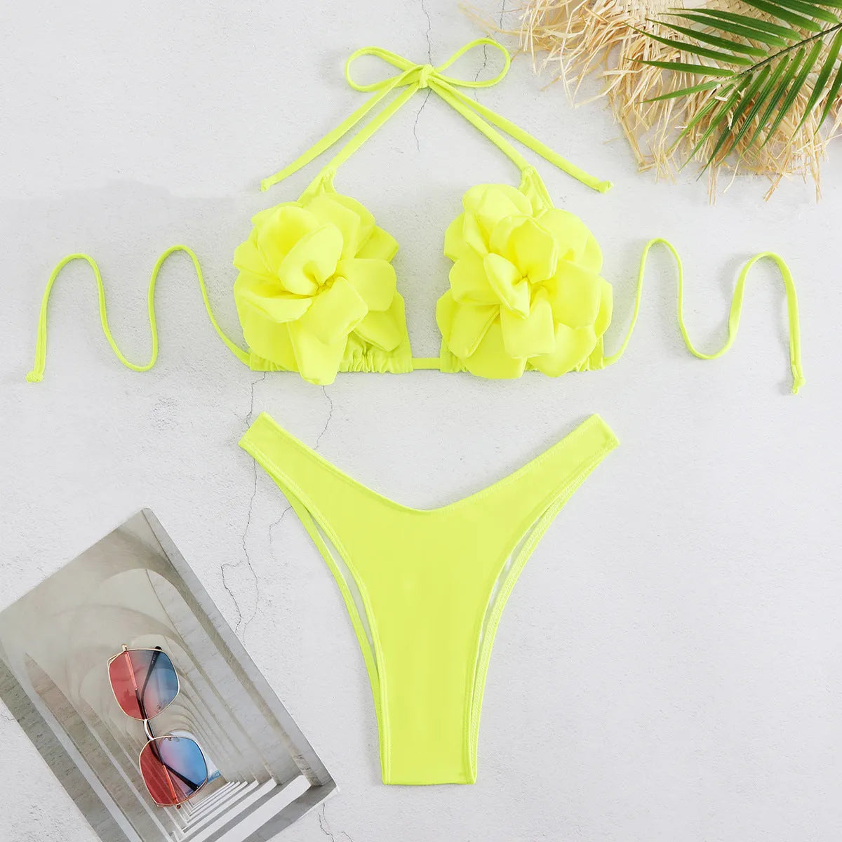 Women's 3D flower low waist bikini swimsuit in solid colour with backless briefs style.