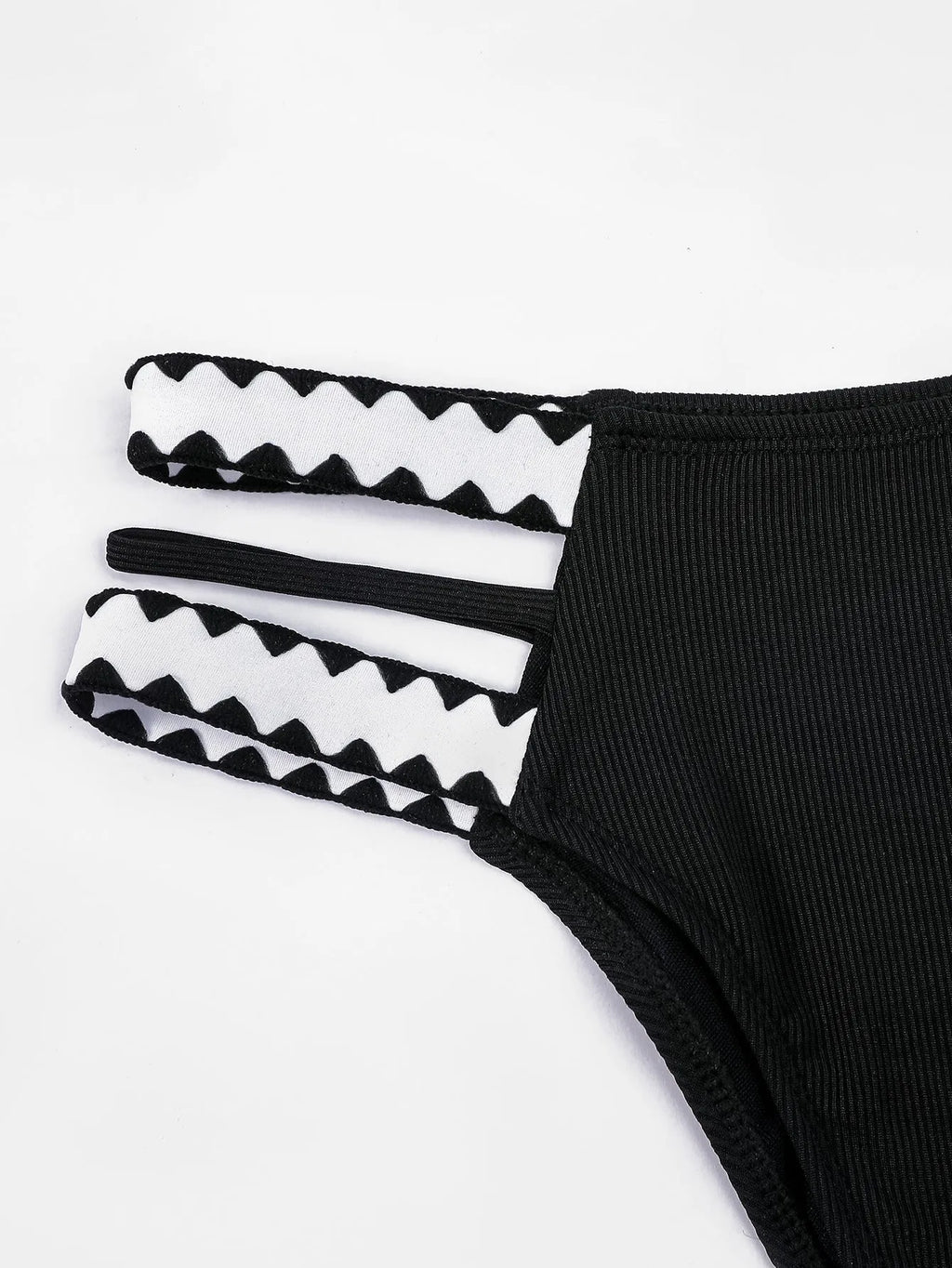 Black women's hollowed-out split swimsuit bikini briefs in polyester fabric