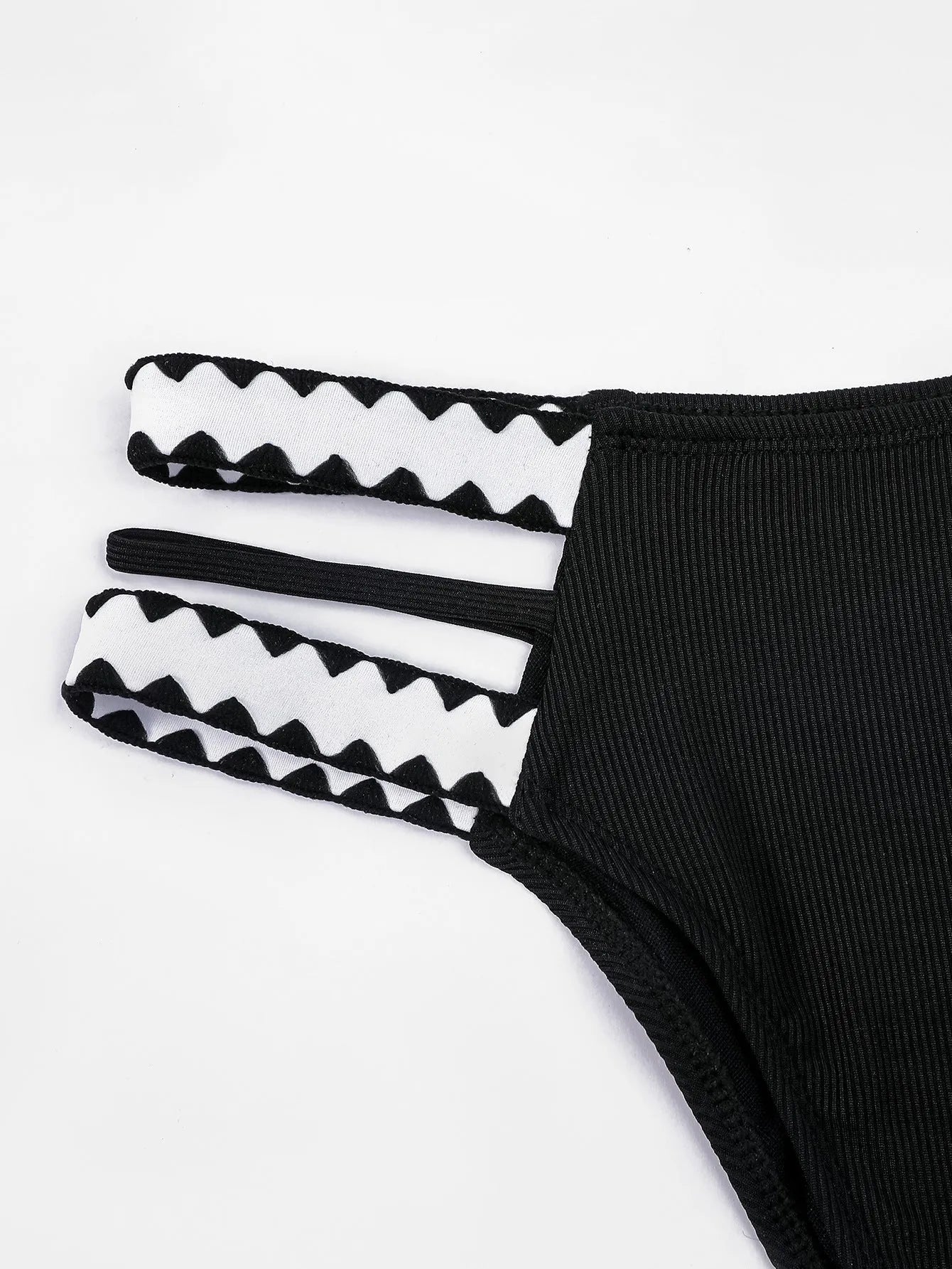 Black women's hollowed-out split swimsuit bikini briefs in polyester fabric