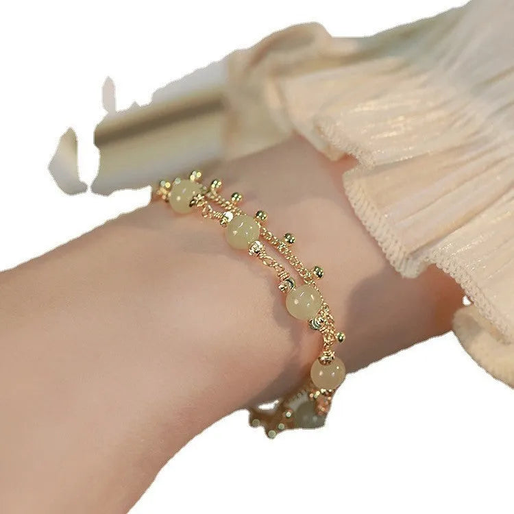Natural Hetian jade bracelet with manual craft princess running bead design