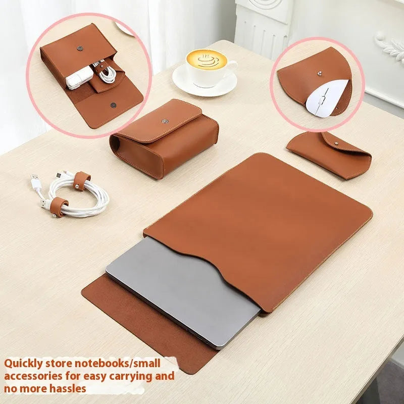 Set of four brown imitation leather laptop corner protectors on a grey laptop.