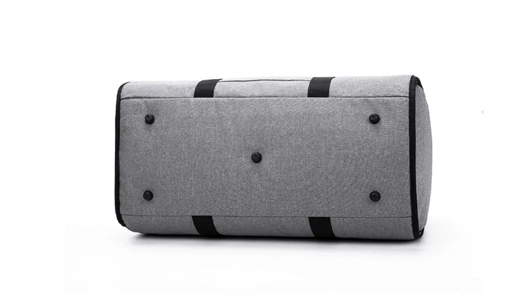 Medium cylindrical travel bag in Oxford cloth, shown in black, with a zipper opening.