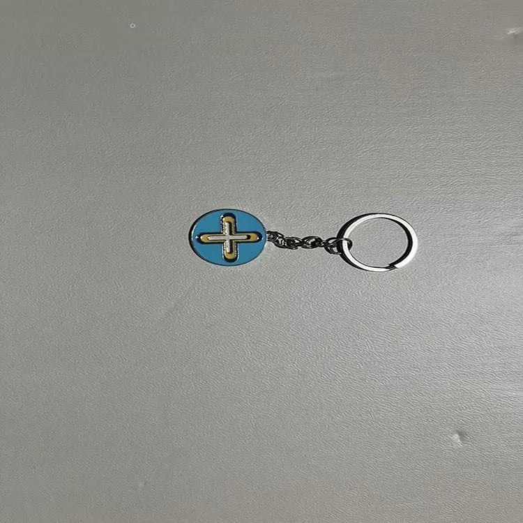 Colourful pendant keychain made of zinc alloy in eight colour options including black, blue, green, pink, purple, red, sky blue, yellow.
