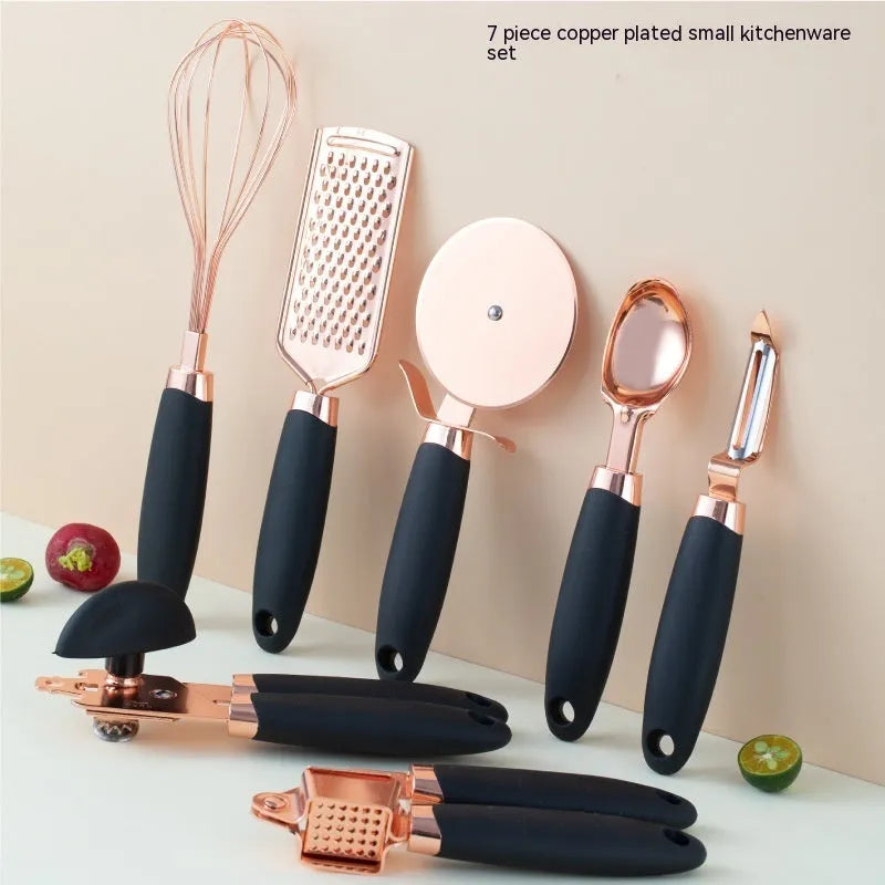 Rose gold plated stainless steel 7-piece kitchen tool set with cutlery rack in mint green colour