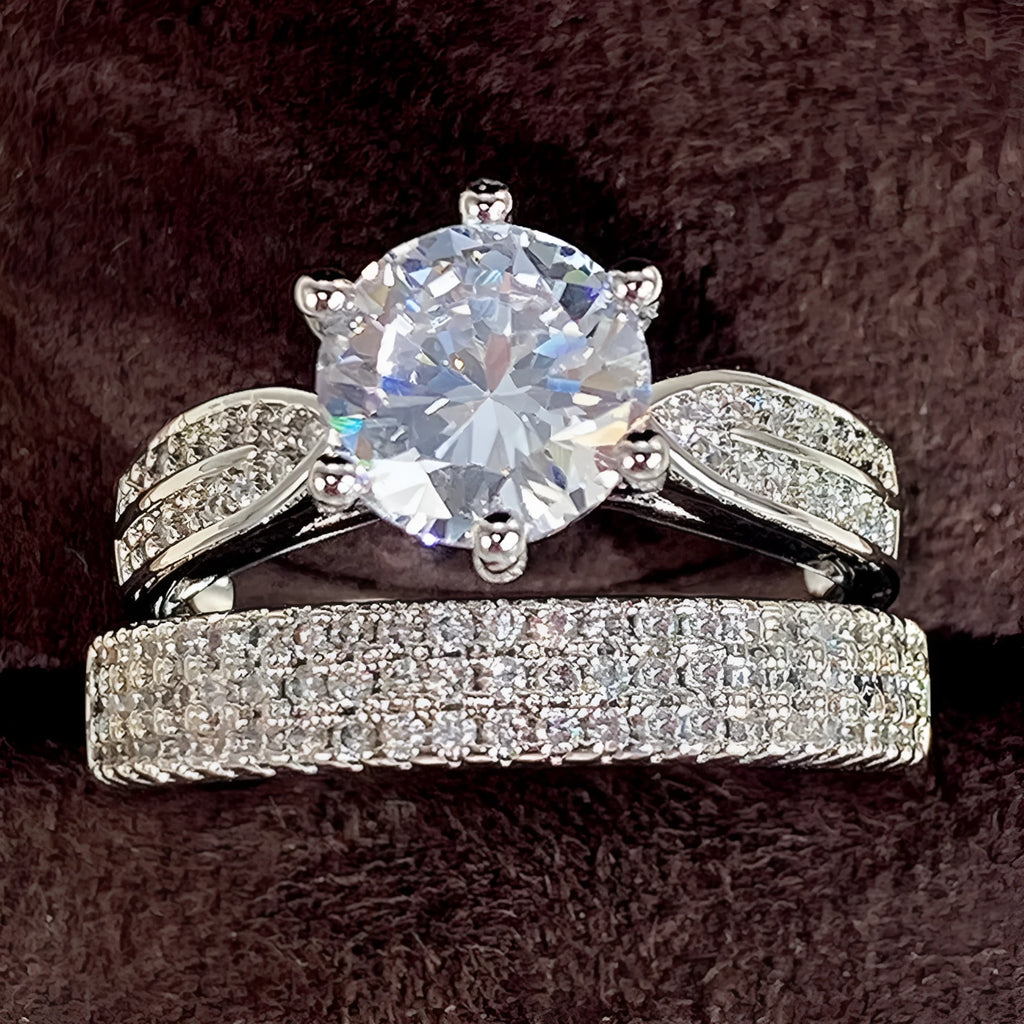 White gold geometric combined wedding ring and simple bracelet on size display.