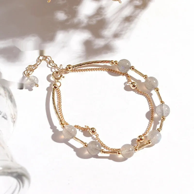 Double layer crystal bracelet with moonstone accents and electroplated copper finish in South Korean style