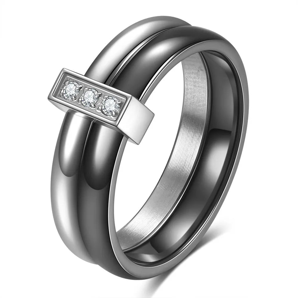 Geometric ceramic women's ring with a round 6mm zirconia stone in steel black colour.