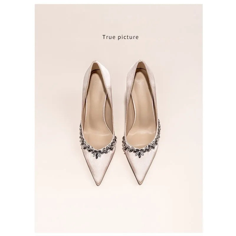 Women's black satin stiletto heels with rhinestone decoration and pointed toe