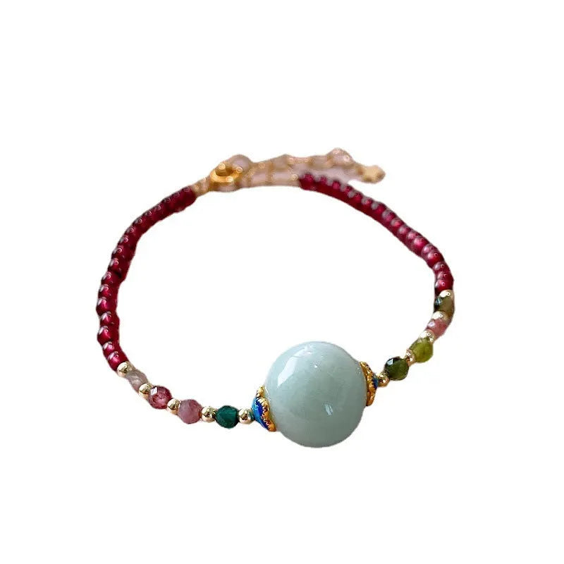 Garnet-coloured tourmaline drop bracelet in electroplated setting for women.