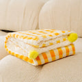 Blue coral fleece pet blanket shown in a large size next to a sleeping dog.