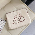 Embroidered cat design nylon tablet protective sleeve with zipper closure.