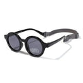 Children's silicone sunglasses with round full frame, UV400 polarised TAC lenses, and flexible TPEE construction for 0-3 year olds