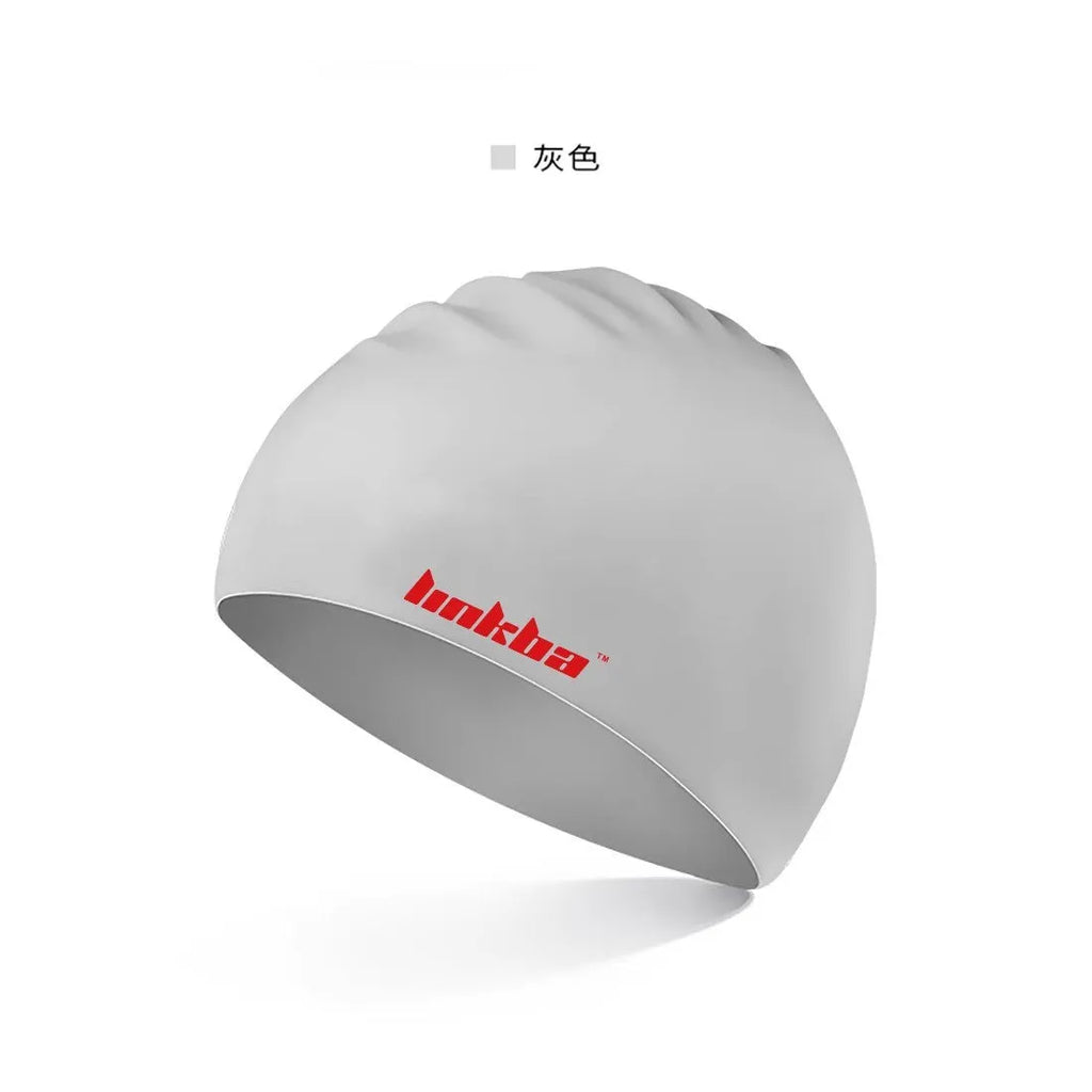 Silicone swimming cap with integrated earmuffs available in five colours with letters pattern
