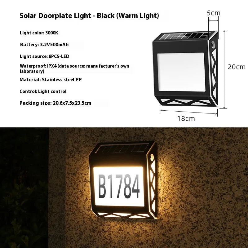 Solar-powered outdoor doorplate light with digital display showing house numbers