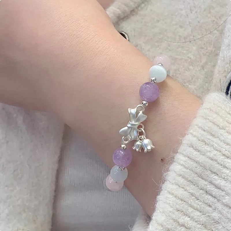 Lavender purple opal bracelet with bowknot design and 10mm crystal beads