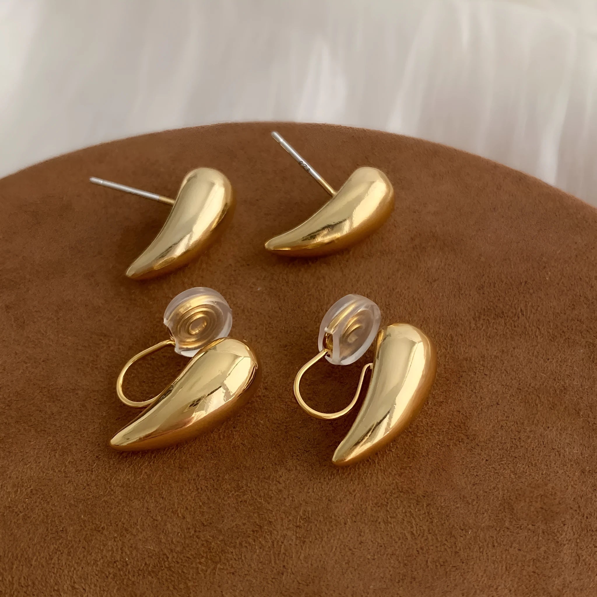 Geometric copper droplet earrings for women with electroplated finish, available as ear clips or studs