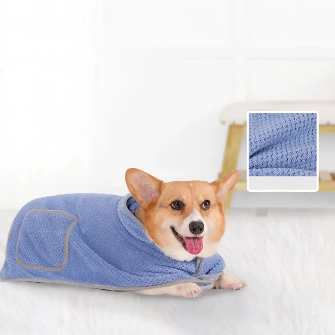 Blue adjustable dog bath robe towel wrapped around a dog, showing sizing chart for XS, S, M, L, and XL.