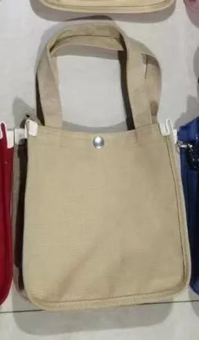 Canvas small square messenger bag for women with magnetic buckle closure in khaki colour