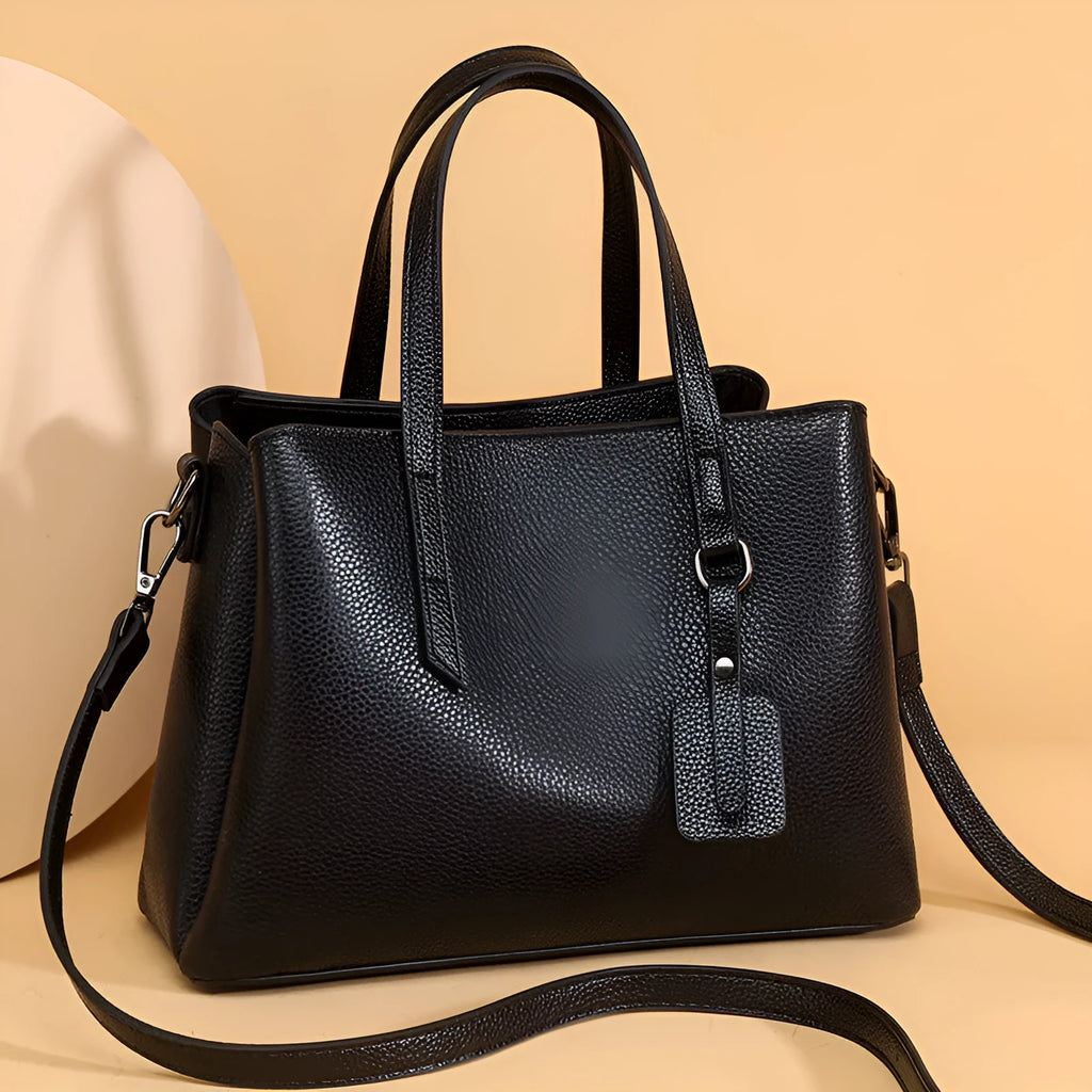 Women's cowhide leather shoulder handbag in horizontal square shape with contrast stitching
