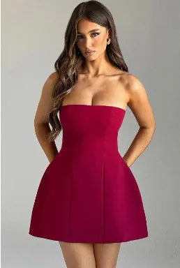 Women's backless tube dress with A-line skirt in solid colour options including black, white, red, and pink