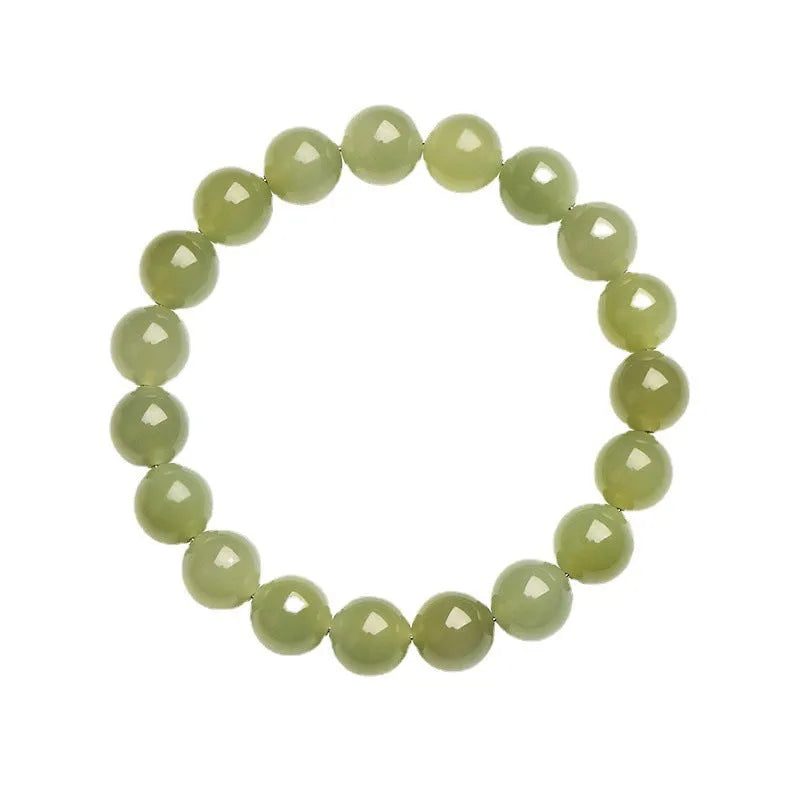 Unisex Hetian jade ball bead bracelet in ice clear colours, showing polished spherical beads on a string.