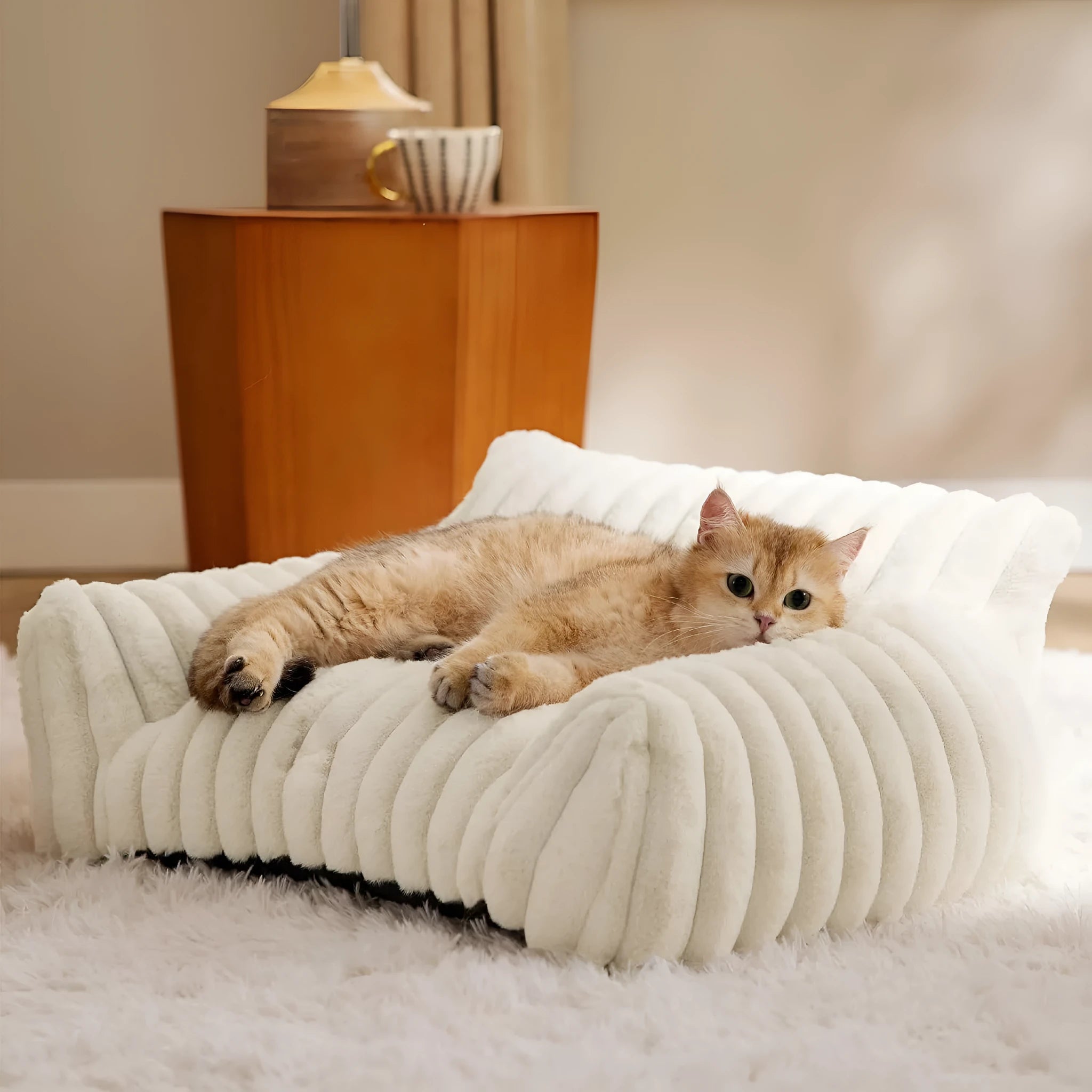 Supportive cat couch bed with three-sided design and soft corduroy fleece fabric in beige colour