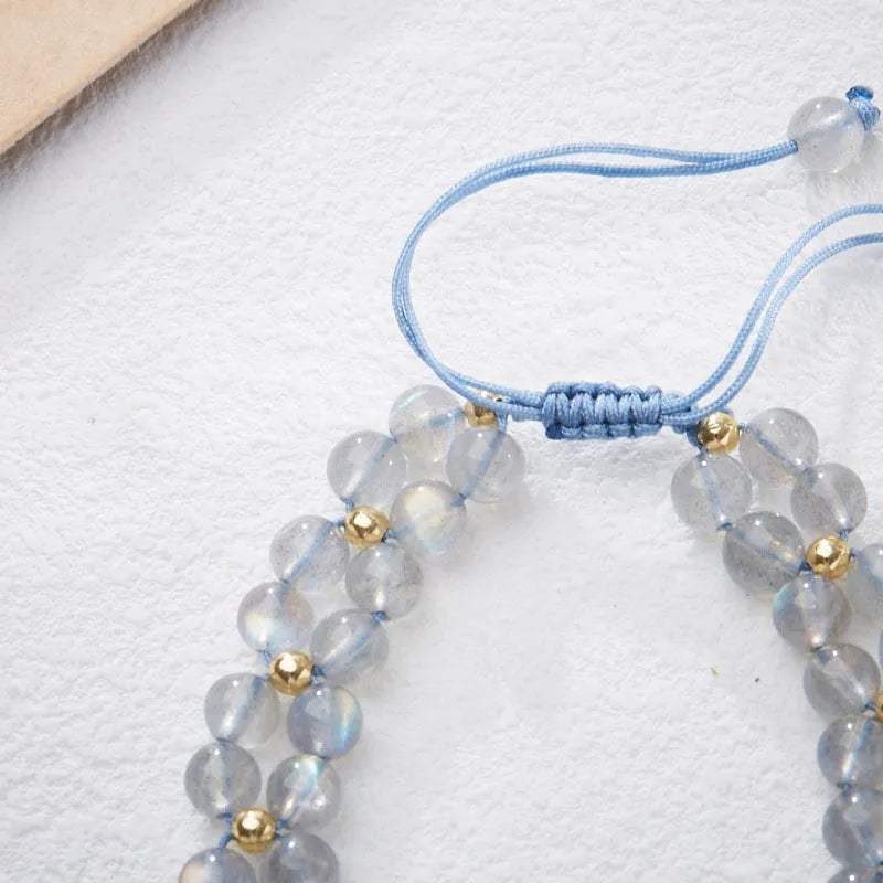 Grey moonstone butterfly charm woven bracelet for women with geometric retro design