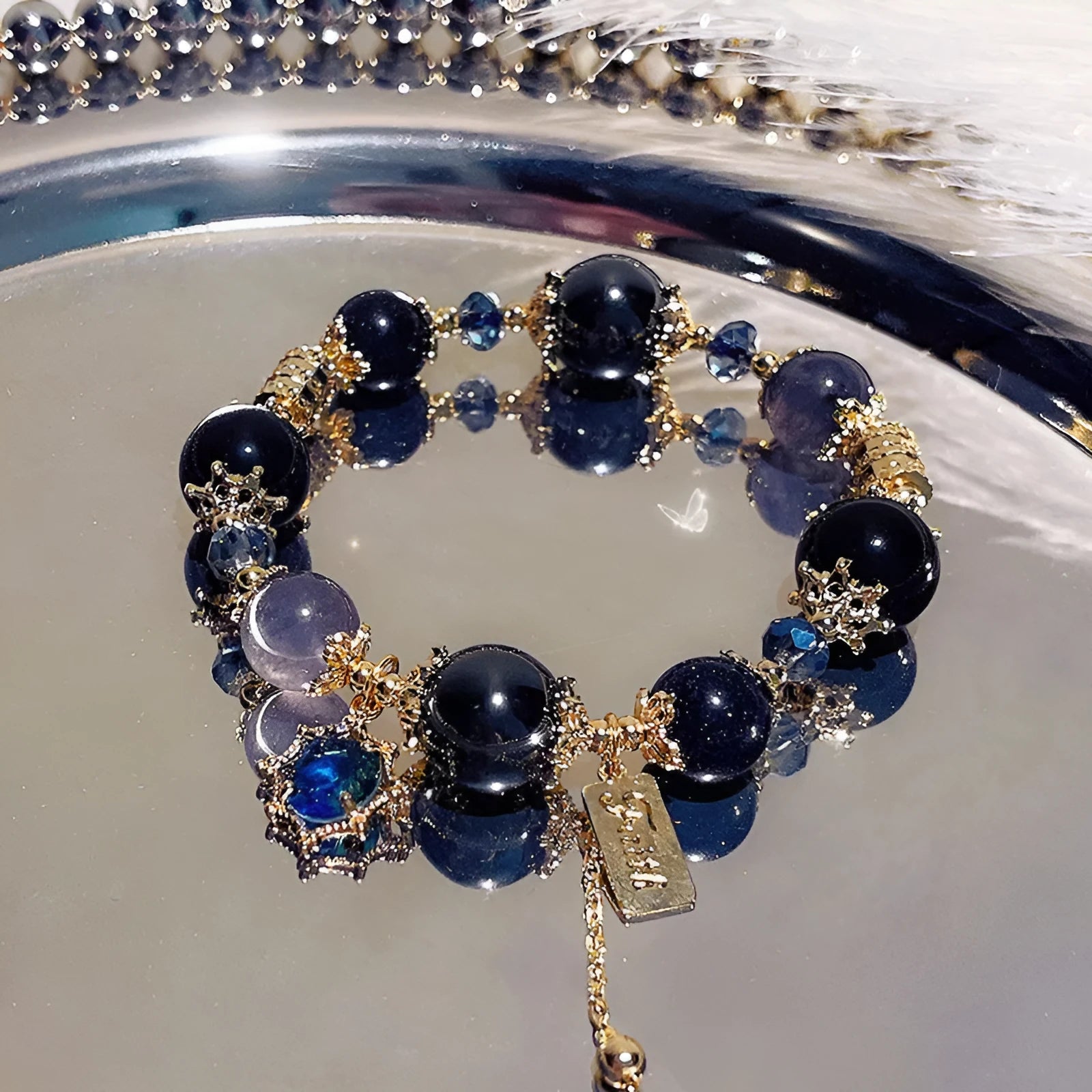 Women's galaxy colour bracelet with snowflake pendant, bow decoration, heart shapes and cartoon character details