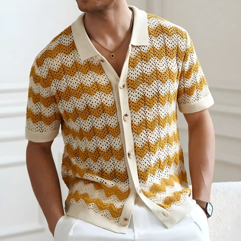 Short sleeve corrugated Tencel sweater with a blue hollow jacquard texture on a hanger.