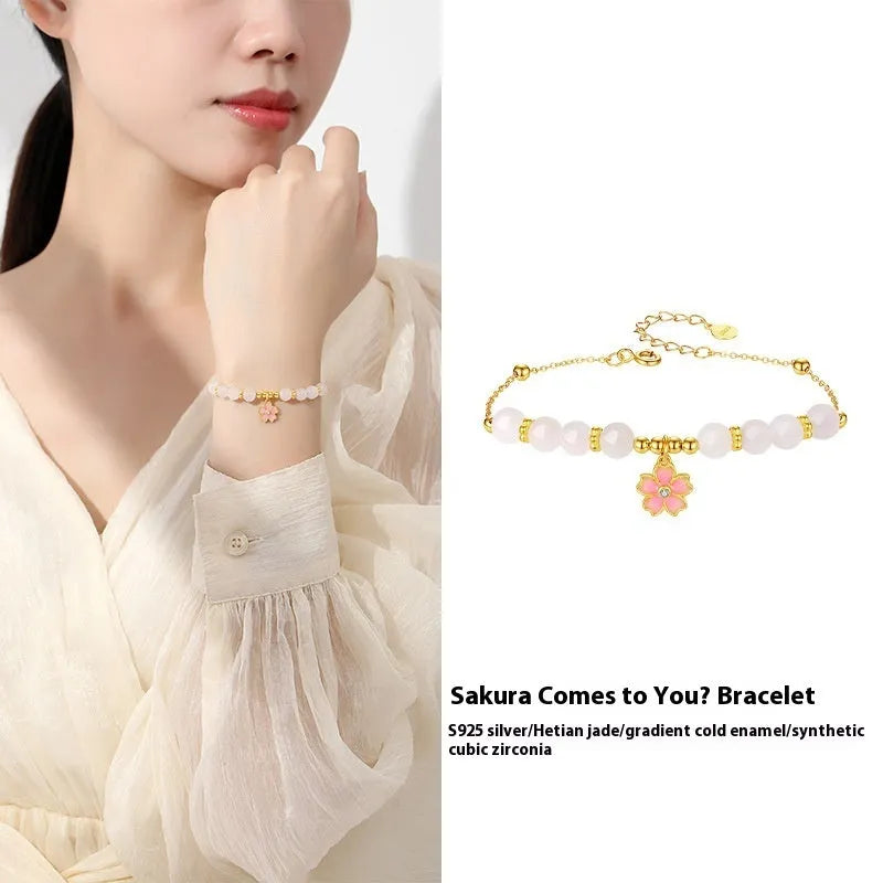 Women's silver bracelet with cherry blossom pendant and Hetian jade beads