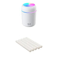Pink USB desktop humidifier with LED lights emitting mist on a wooden desk