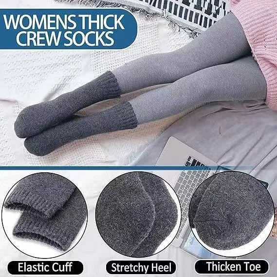A pair of mixed colour wool and cashmere mid-calf tube socks laid flat.