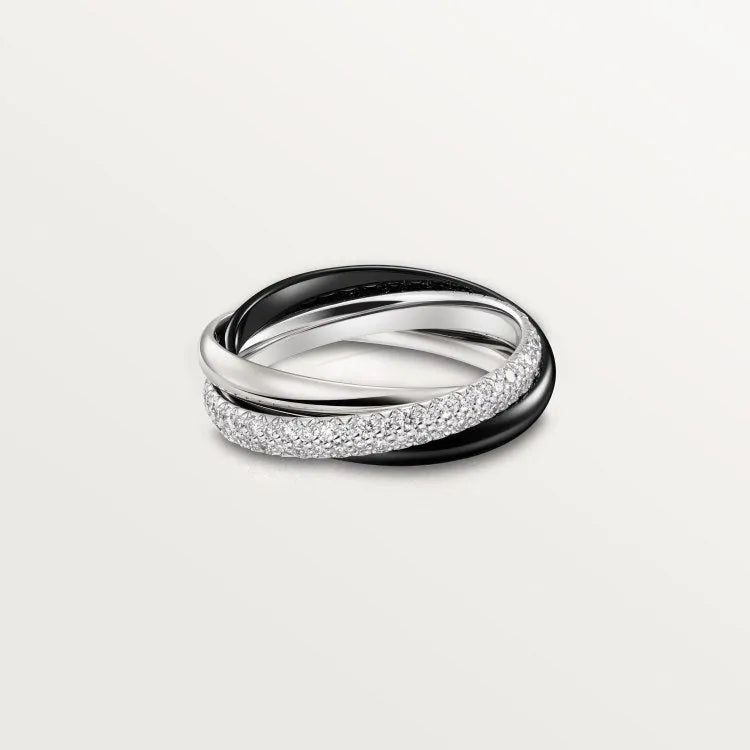Geometric U-shaped sterling silver couple ring with full diamond pavé setting on a black background.
